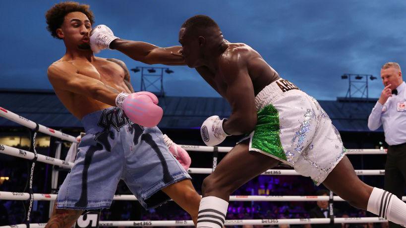 Ben Whittaker evades a punch from Ezra Arenyeka