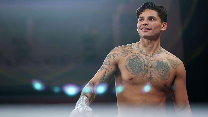 Ryan Garcia winks as he does an open workout
