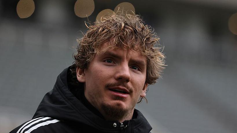 Nick Woltemade arrives before Newcastle United's game against Brentford at St James' Park in February 2026