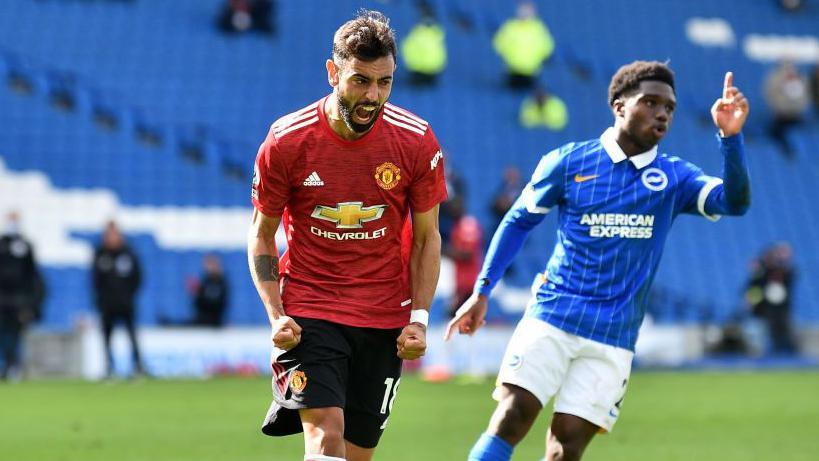Manchester United midfielder Bruno Fernandes celebrates after scoring a late winner at Brighton