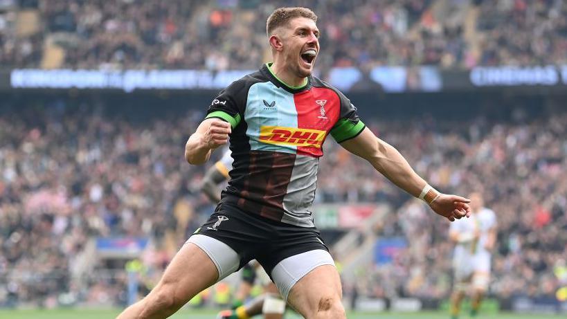 Luke Northmore celebrates after scoring a try for Harlequins at Twickenham