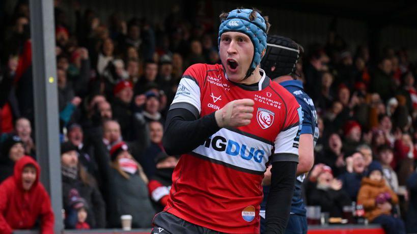 Josh Hathaway celebrates scoring a try for Gloucester at Kingsholm