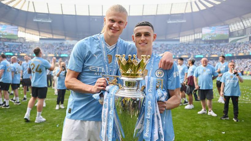 Manchester City's Erling Haaland and Phil Foden