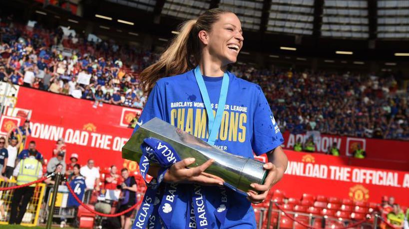 Melanie Leupolz with the Women's Super League trophy