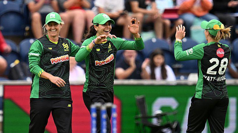 Southern Brave players Sophie Devine, Maia Bouchier and Danni Wyatt-Hodge celebrate a wicket against Welsh Fire 