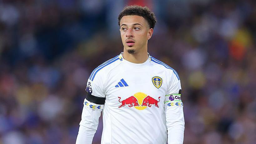 Ethan Ampadu wearing the white colours of Leeds United and a captain's armband.