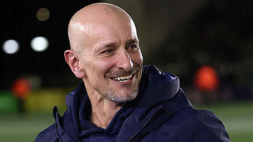 Alan Dickens smiles on the pitch after beating Gloucester in January