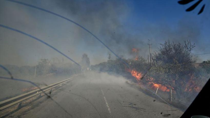  Fires burn along the road from Kurakhove to Hirnyk as a result of Russian artillery shelling, Pokrovsk district, Donetsk region, eastern Ukraine. (Photo credit should read Dmytro Smolienko / Ukrinform/Future Publishing via Getty Images