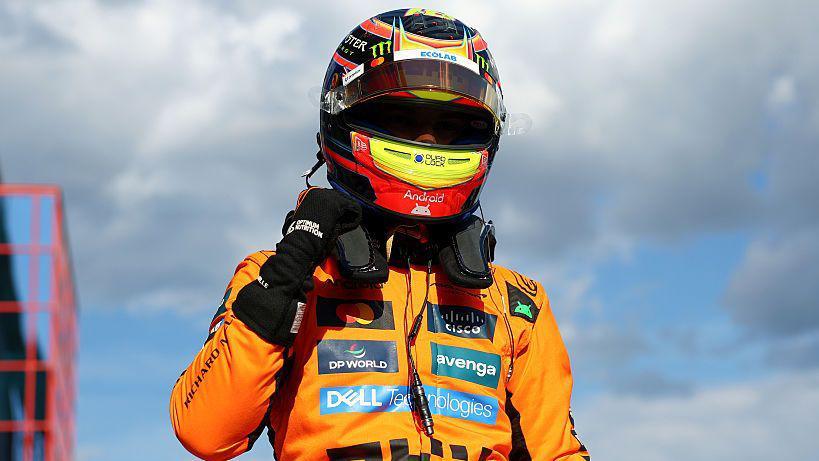Oscar Piastri clenches his fist in celebration after taking pole position for the Emilia-Romagna Grand Prix
