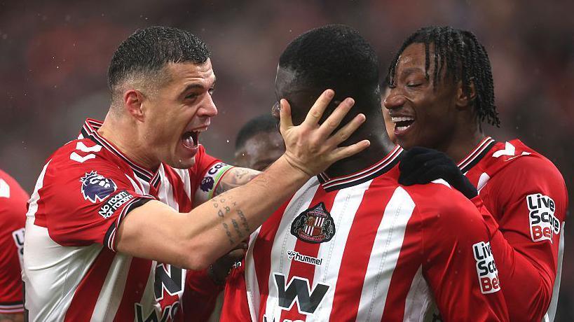 Sunderland players Granit Xhaka and Brian Brobbey celebrate a goal