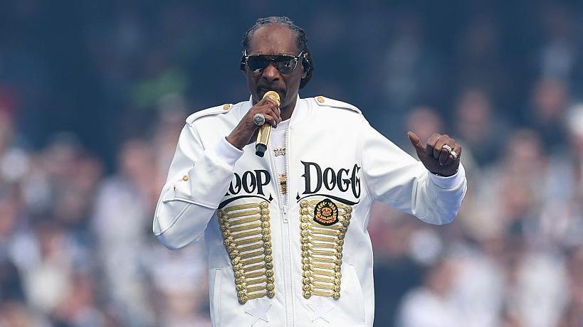 Snoop Dogg performing on stage