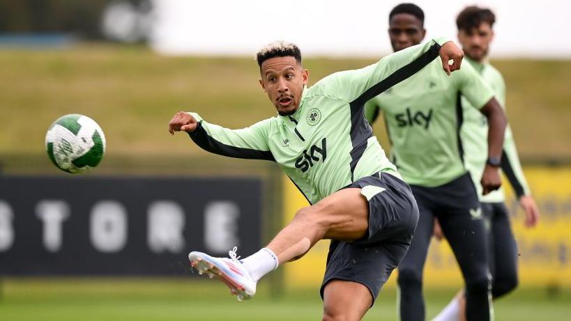 Callum Robinson hits a shot during a Republic of Ireland training session