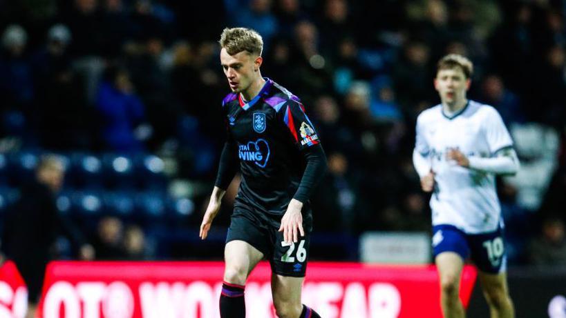 Pat Jones playing for Huddersfield Town