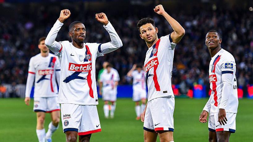 Ousmane Dembele, Goncalo Ramos and Nuno Mendes celebrate one of PSG's goals against Dunkerque