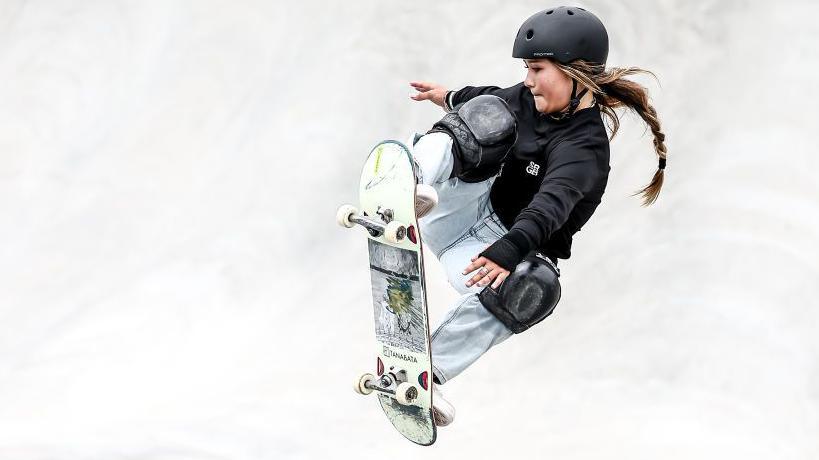 Sky Brown riding her skateboard