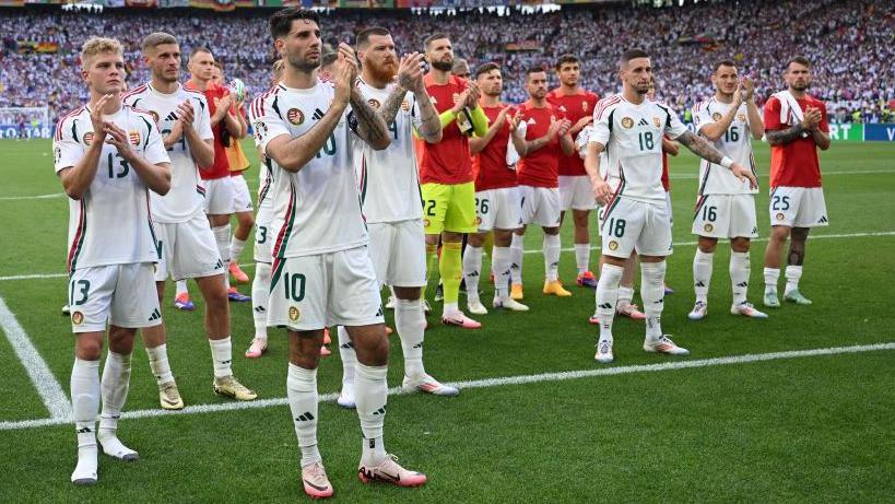 Dominik Szoboszlai leads the Hungarian players in applauding their fans