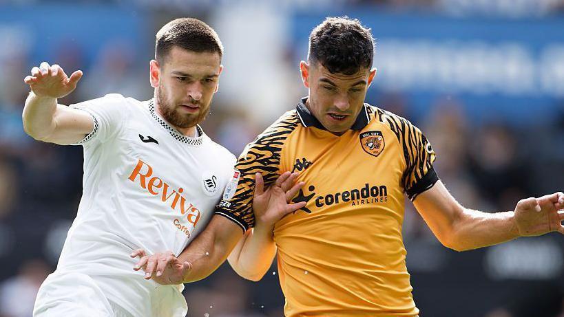 Zan Vipotnik battles with John Egan