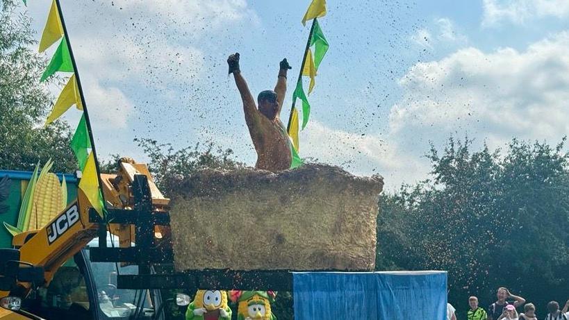 Yorkshireman triumphantly raises his fists following the stunt