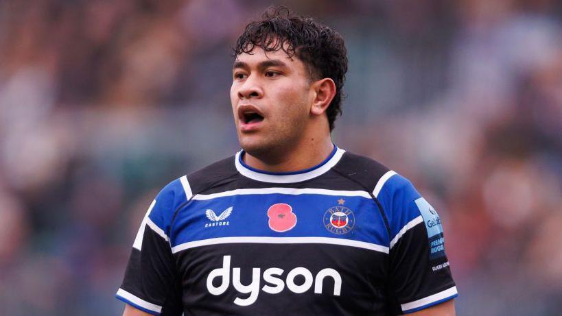 Kepu Tuipulotu standing on the field during a Bath game