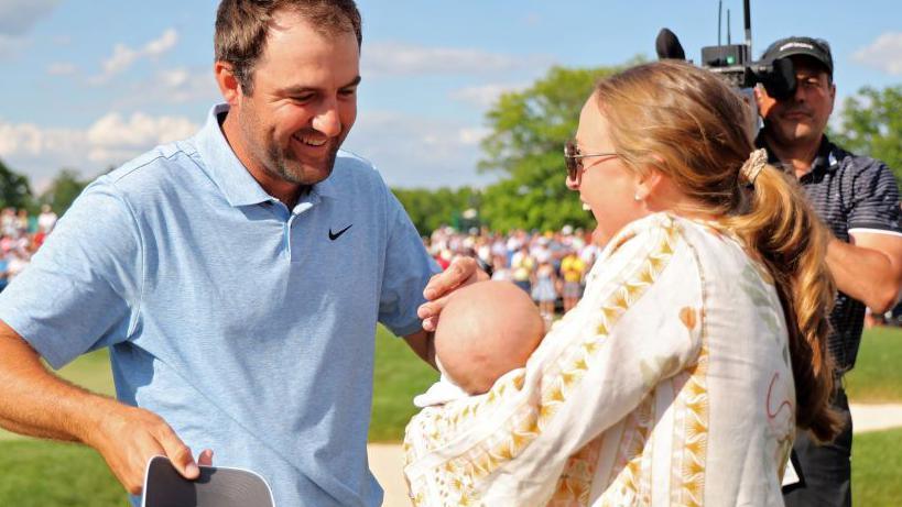 Scottie Scheffler with his wife Meredith and new son Bennett after winning the Memorial Tournament