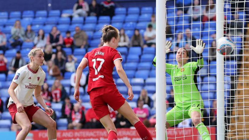 Jenna Clark scores for Liverpool against Manchester United