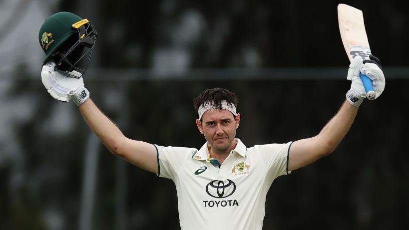 Kurtis Patterson celebrates after completing his century for Australia A against England A