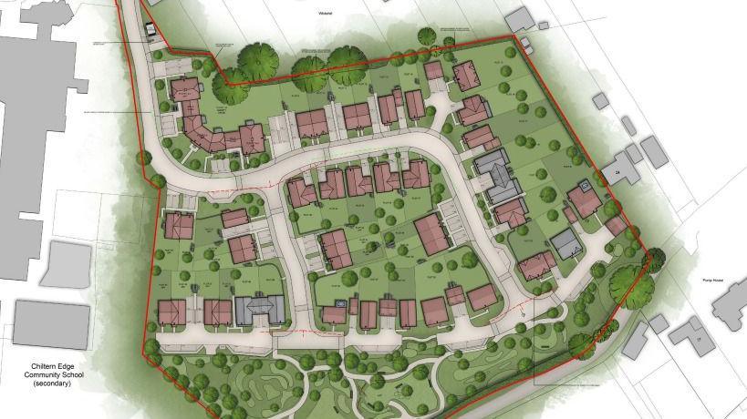 A computer generated image showing an overhead view of the proposed development. The homes are surrounded by trees and green spaces.