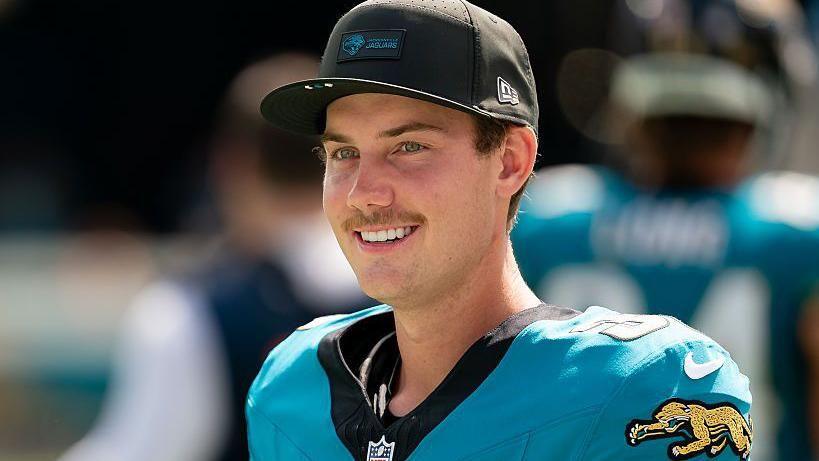 Jacksonville Jaguars kicker Cam Little smiles as he walks the field during an NFL game against the Houston Texans