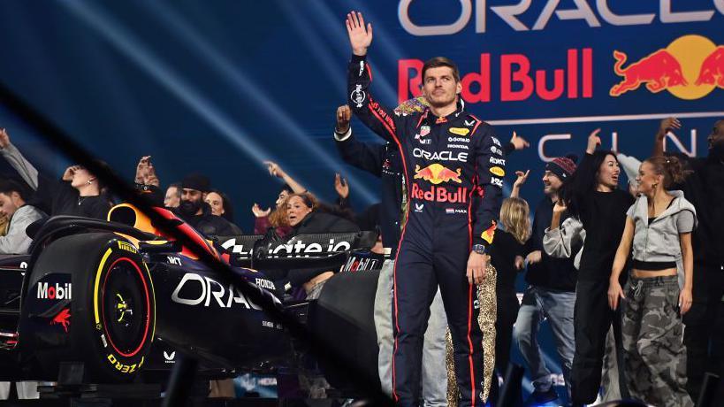 Max Verstappen waves to the crowd at the O2 Arena