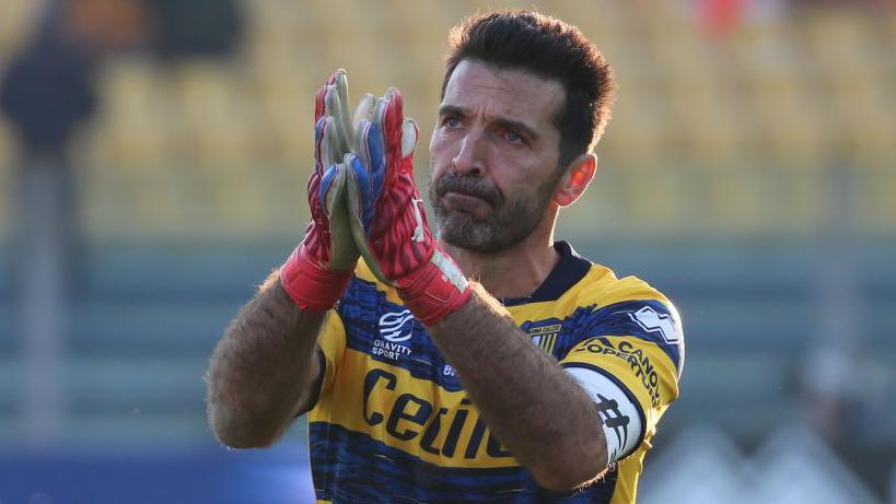 Gianluigi applauds the fans during a Parma match in Serie B