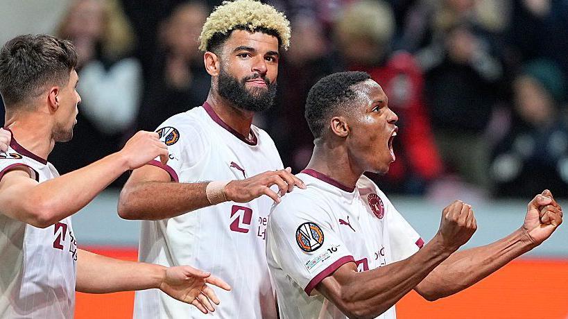 Midtjylland's Senegalese defender Ousmane Diao celebrates scoring his team's second goal during the UEFA Europa League first round.