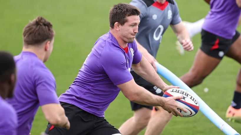 Tom Curry running with the ball in England training