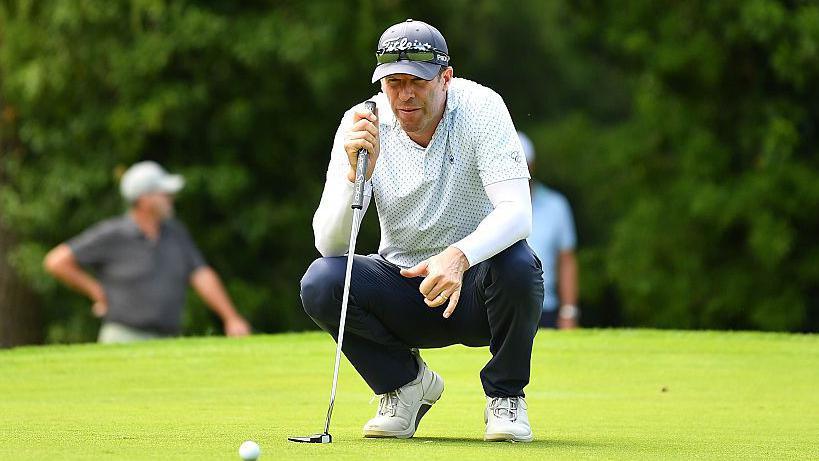 Bradley Dredge lines up a putt