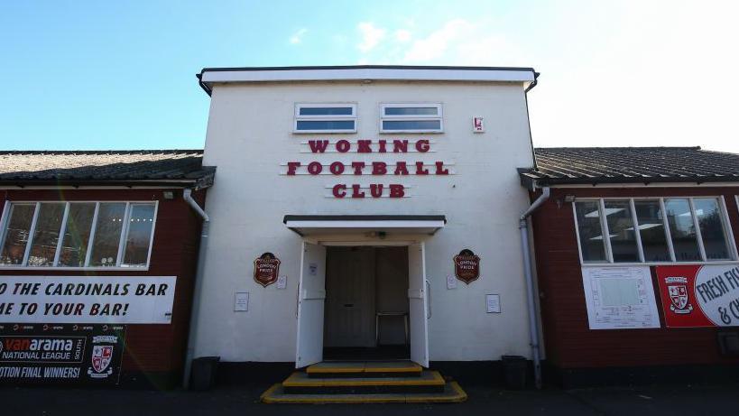 The entrance to Kingfield Stadium, home of Woking FC