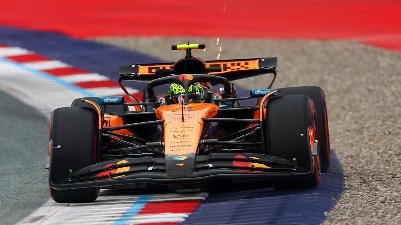 McLaren's Lando Norris goes around a corner during Austrian Grand Prix second practice
