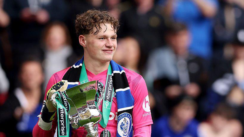 Oliver Whatmuff with the National League promotion final trophy