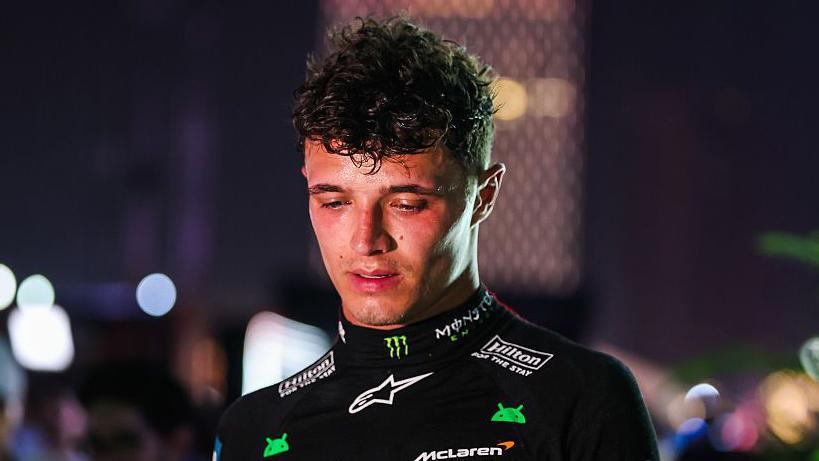 Lando Norris walking with his eyes to the floor after the Saudi Arabian Grand Prix