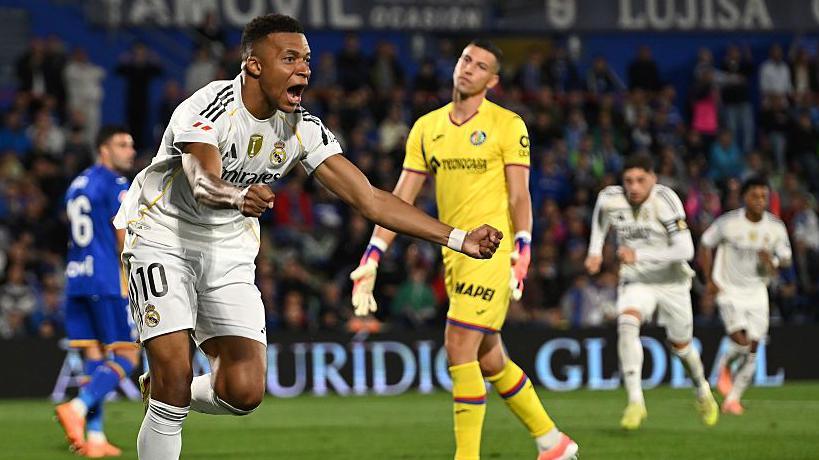 Kylian Mbappe celebrates scoring for Real Madrid
