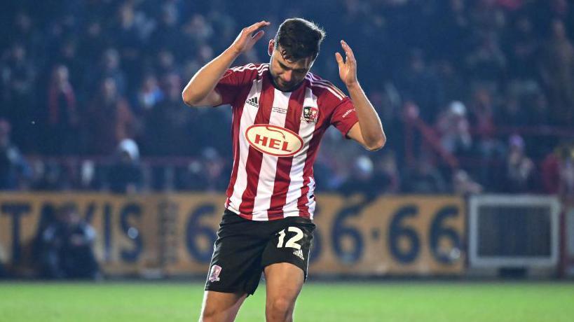 Exeter's Reece Cole shows his frustration after missing a penalty