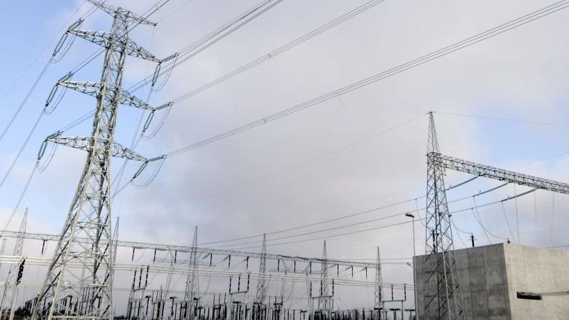 Pylon and wires at Estlink 2 transformer station in Porvoo, Finland