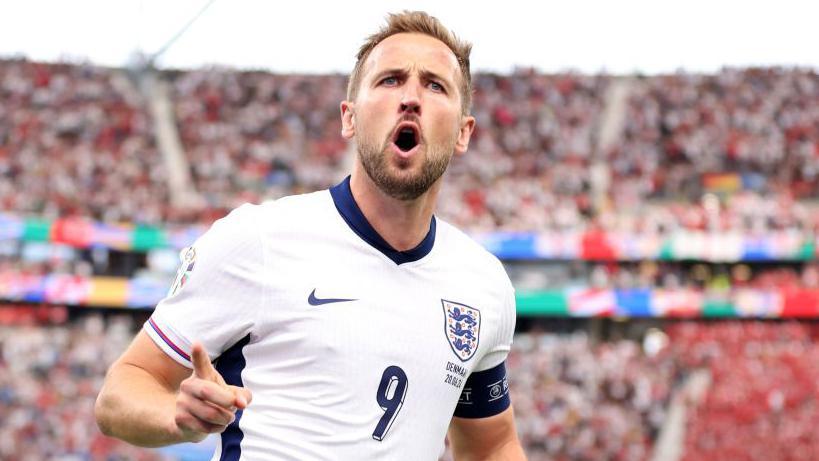 England captain Harry Kane celebrates against Denmark