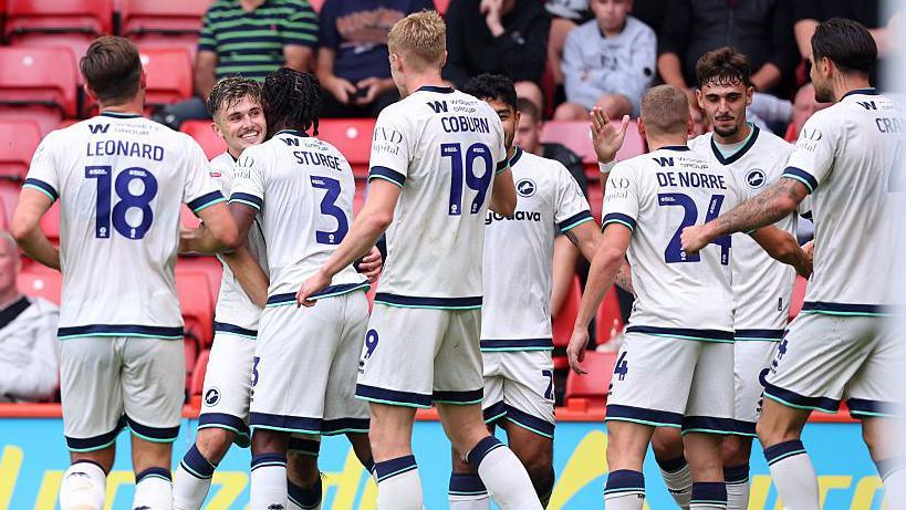 Millwall players celebrate at Sheffield United
