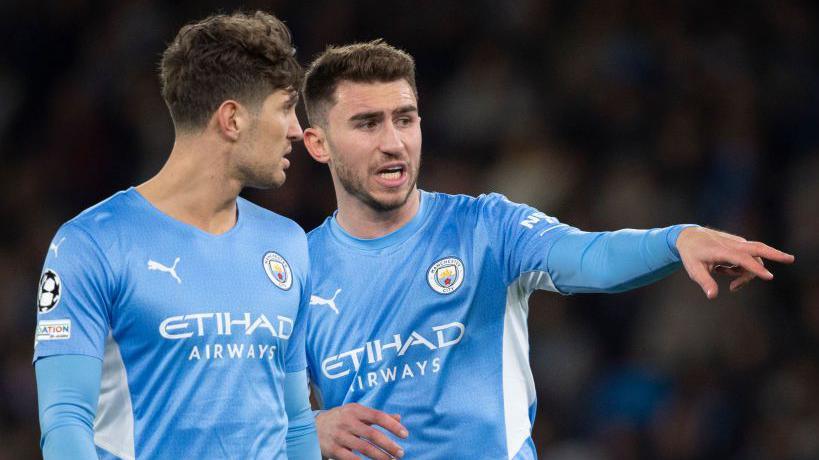 Manchester City defenders John Stones and Aymeric Laporte 