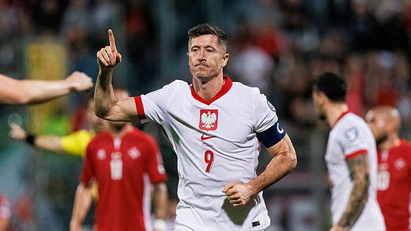 Robert Lewandowski celebrates a goal for Poland against Malta in World Cup qualifying 