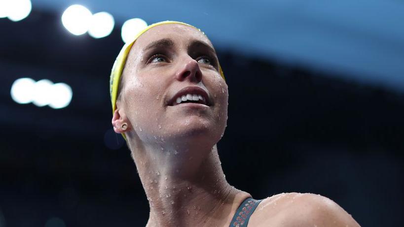 Emma McKeon of Team Australia reacts after winning the gold medal and breaking the Olympic record in the Women’s 50m Freestyle Final on day nine of the Tokyo 2020 Olympic Games