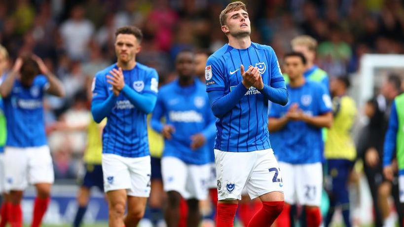 Zak Swanson of Portsmouth reacts after the final whistle in the Championship match between Portsmouth FC and West Bromwich Albion FC at Fratton Park.