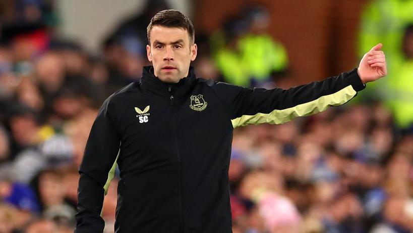 Seamus Coleman directs the Everton team from the touchline