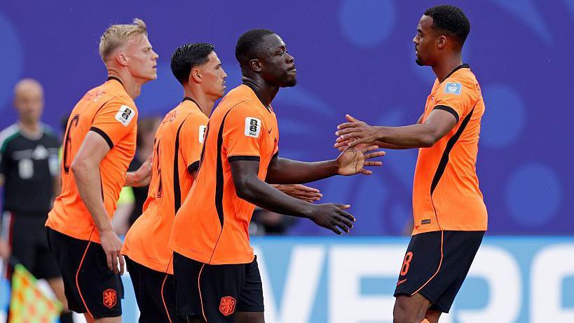 The Netherlands celebrate after Brian Brobbey scores against Tunisia