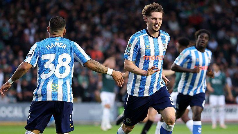 Jack Rudoni celebrates scoring Coventry's second goal