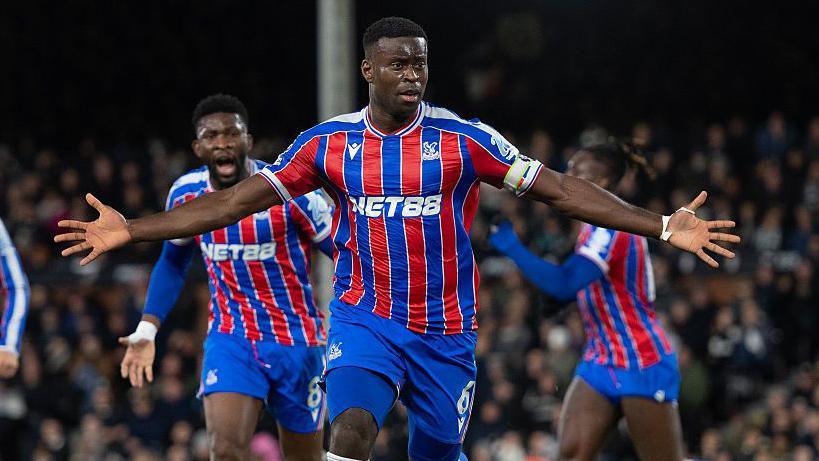 Marc Guehi celebrates scoring for Crystal Palace